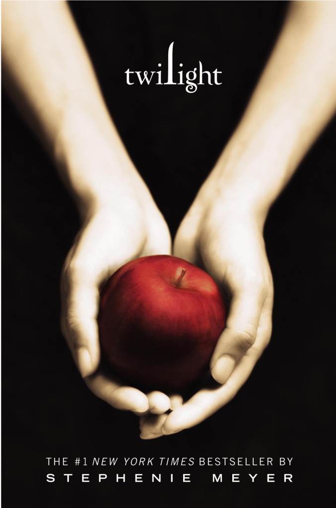 The cover of Twilight, featuring two hands holding an apple.