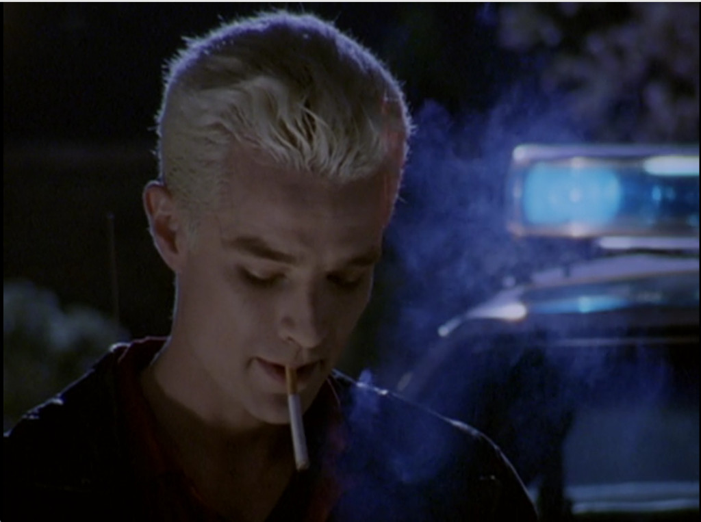 Spike smoking a cigarette