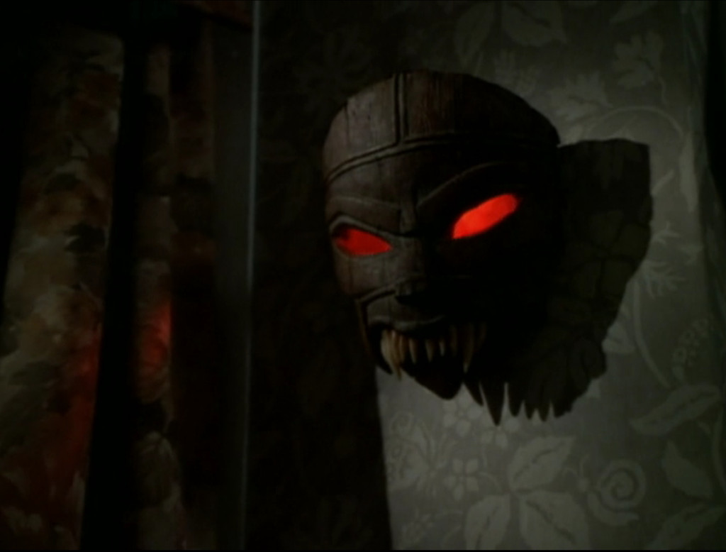 The mask, now with glowing red eyes.
