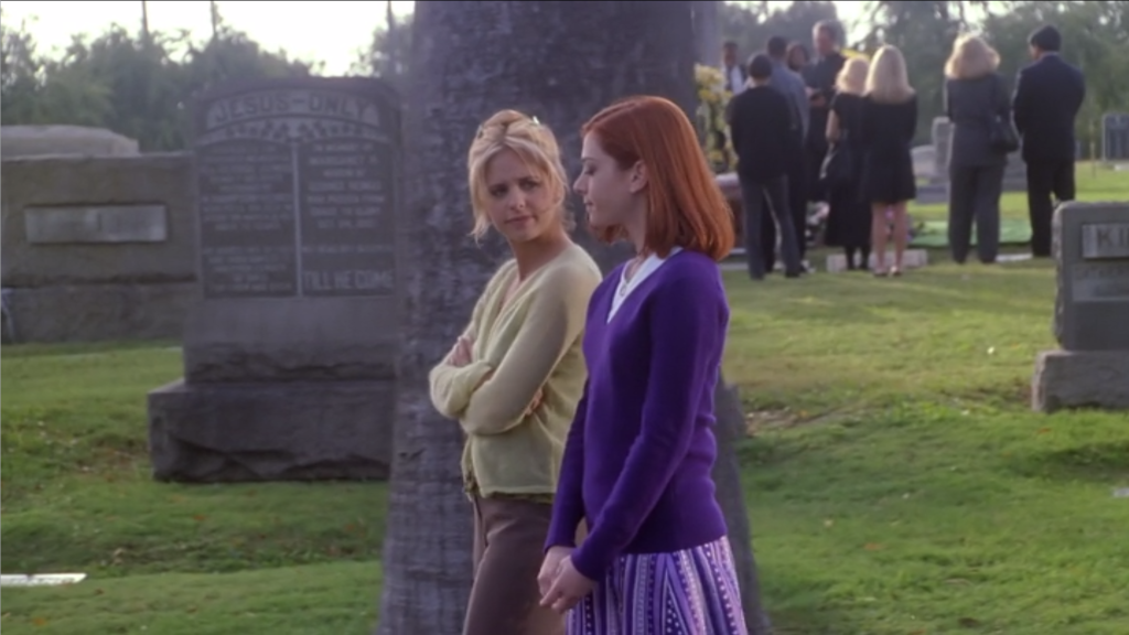 Buffy and Willow, walking past the funeral, super casual.