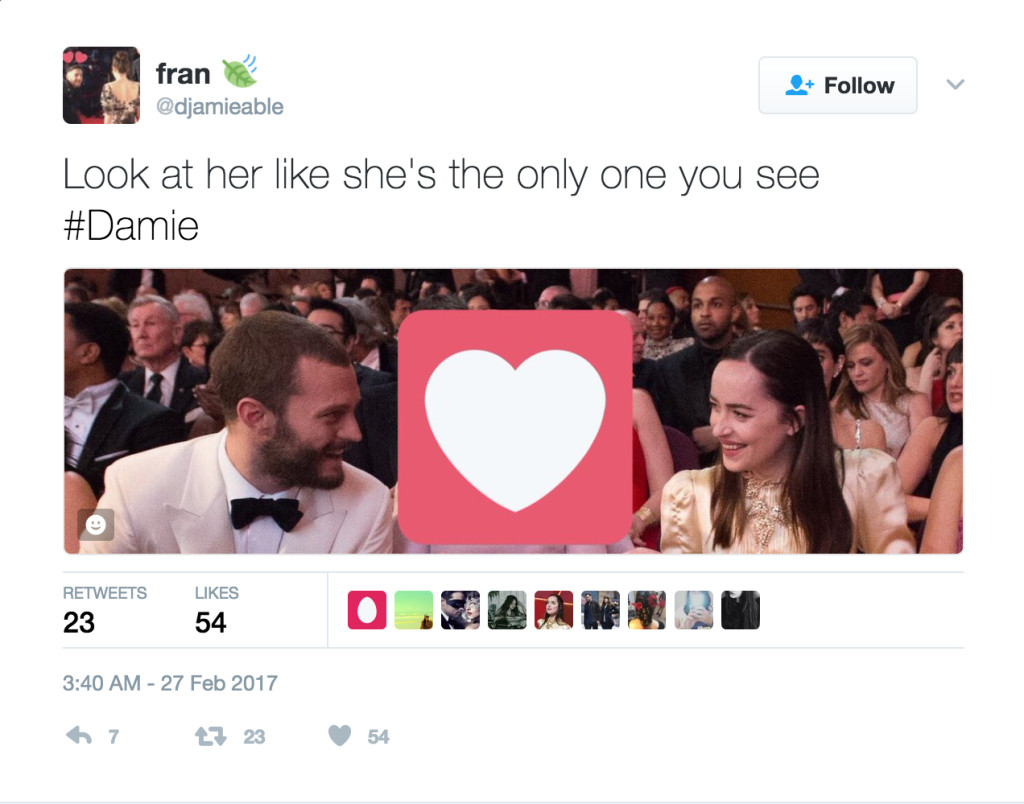 A tweet from "Fran" that reads "Look at her like she's the only one you see #Damie" with the same photo of Dornan and Johnson with his wife between them. The photo has been manipulated to place a giant heart over his wife, completely blocking her out.