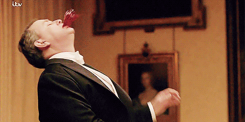 gif of Lord Grantham on Downton Abbey puking up blood all over the dining room table and everyone else.