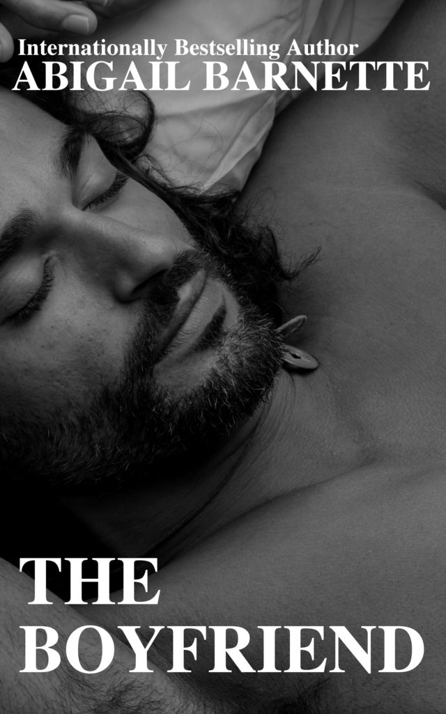 The cover features a picture of man of a middle-eastern ethnicity (very vague, I'm sorry, but it's from stock and I don't know who the guy is to tell you what his exact ethnicity is) reclining in sleep. He has a short beard and mussed, wavy dark hair that's about shoulder-length. Also, the longest eyelashes you've ever seen. There's the title of the book and my pseudonym on the cover, as well, but the highlight is this super hot sleeping dude who looks like a damn angel.
