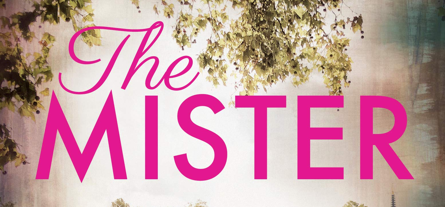 A slice of the cover of E.L. James's THE MISTER, with the title in pink with some leaves above it.